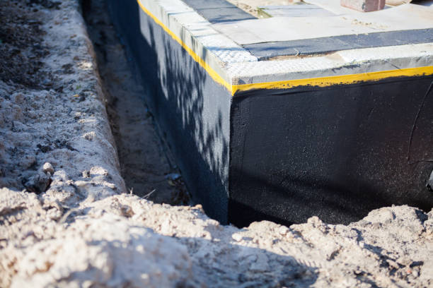 Professional Emergency Waterproofing technician working in Stafford, VA